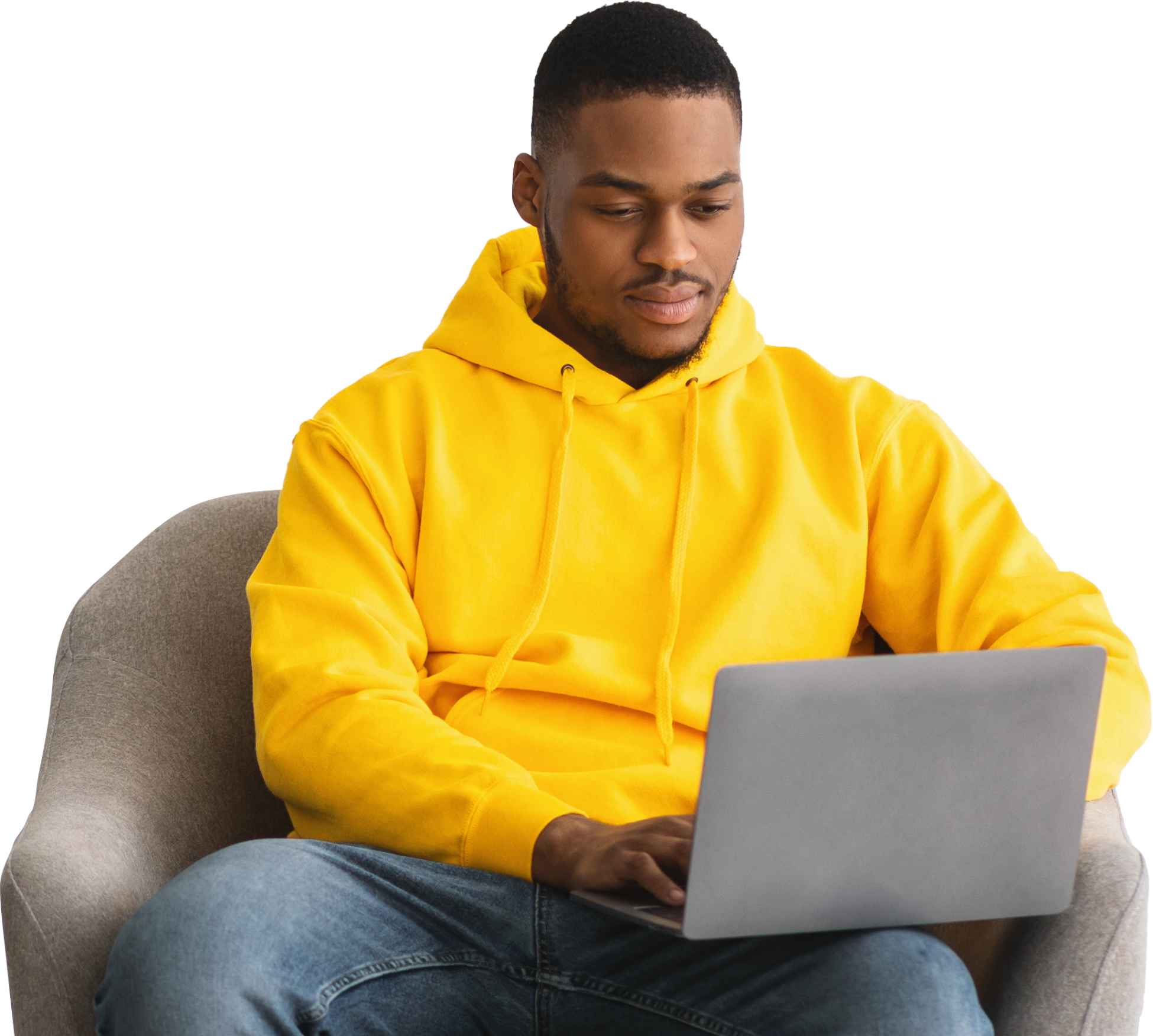 a man sits in a chair at a laptop and sends an email