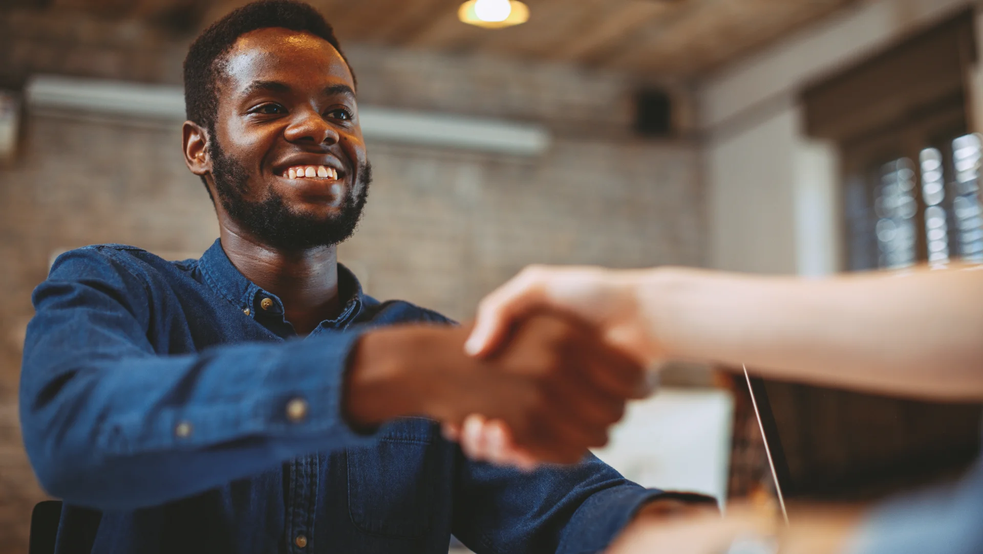 man shaking a hand