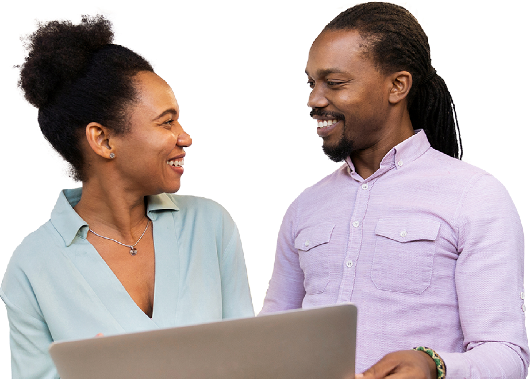 man and woman talking near laptop