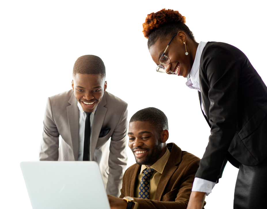 three coworkers around a computer smiling while working